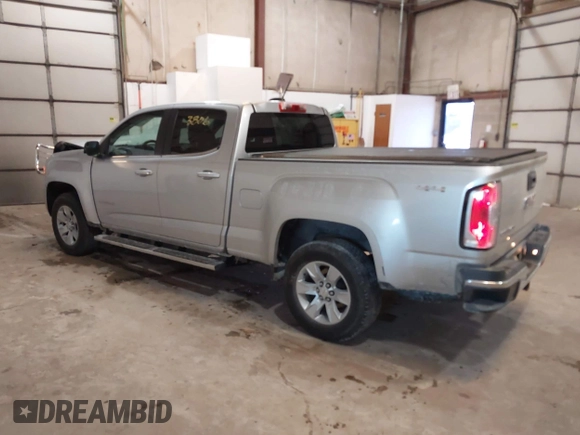 2015 GMC Canyon 4WD SLE with VIN 1GTG6BE36F1124627, listed as a IAAI auction lot 41623806 with 104,182 mi miles and . Bid and sale history available at carsss.com. Image 3.