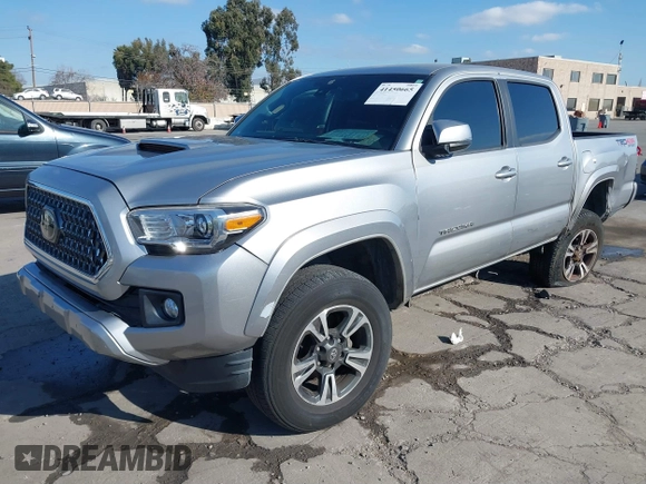2018 Toyota Tacoma SR with VIN 3TMCZ5AN6JM185891, listed as a IAAI auction lot 41450665 with 53,749 mi miles and . Bid and sale history available at DreamBid. Image 18.