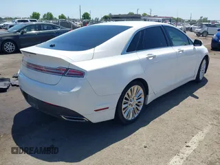 2013 Lincoln MKZ with VIN 3LN6L2JK2DR800880, listed as a IAAI auction lot 42407838 with 126,484 mi miles and . Bid and sale history available at DreamBid. Image 4.