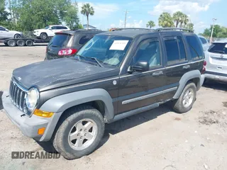 2005 Jeep Liberty Sport with VIN 1J4GL48545W655788, listed as a IAAI auction lot 41914703 with 166,899 mi miles and . Bid and sale history available at carsss.com. Image 2.