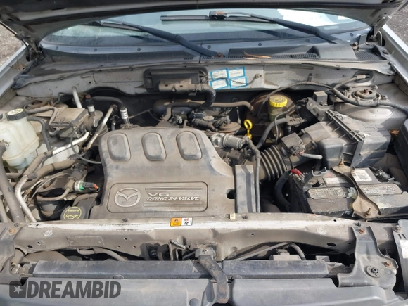 2001 Mazda Tribute LX with VIN 4F2YU08151KM06561, listed as a IAAI auction lot 41478779 with 54,826 mi miles and . Bid and sale history available at DreamBid. Image 10.