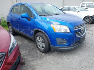 2015 Chevrolet Trax LS with VIN KL7CJKSB9FB197233, listed as a IAAI auction lot 41198111 with 54,889 mi miles. Bid and sale history available at carsss.com. Image 1.