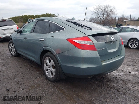 2012 Honda Crosstour EX-L z VIN 5J6TF2H56CL003893, wystawiony jako IAAI lot #41917798 z przebiegiem 205 050 mil mil oraz . Historia ofert i sprzedaży dostępna na DreamBid. Obrazek 3.