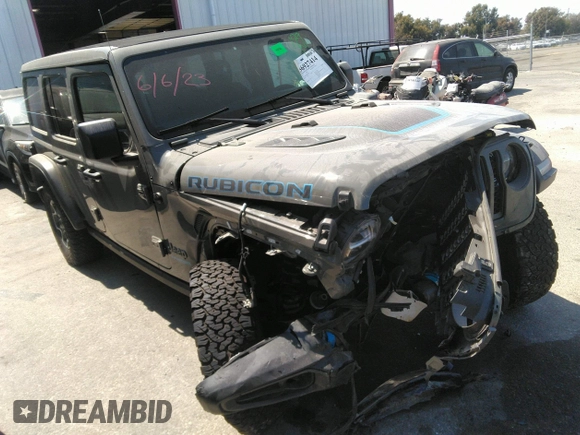 2022 Jeep Wrangler Unlimited Rubicon with VIN 1C4JJXR60NW182756, listed as a IAAI auction lot 36927414 with Not provided miles and . Bid and sale history available at DreamBid. Image 13.