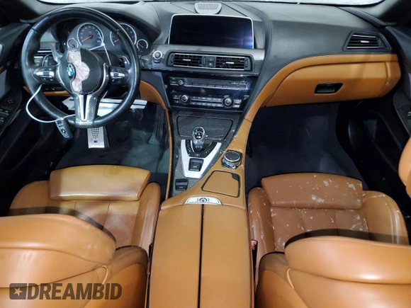 2016 BMW M6 z VIN WBS6G9C58GD932069, wystawiony jako Copart lot #55722063 z przebiegiem 61 793 mil mil oraz . Historia ofert i sprzedaży dostępna na DreamBid. Obrazek 8.