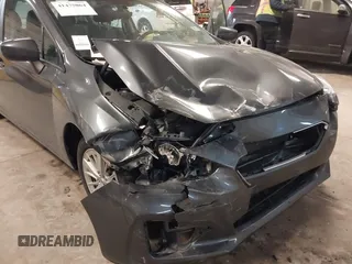 2018 Subaru Impreza Premium z VIN 4S3GKAD67J3619711, wystawiony jako IAAI lot #41475064 z przebiegiem 58 818 mil mil oraz . Historia ofert i sprzedaży dostępna na DreamBid. Obrazek 6.