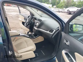 2014 Dodge Journey SXT z VIN 3C4PDCBG8ET126938, wystawiony jako IAAI lot #42526536 z przebiegiem 142 664 mil mil oraz . Historia ofert i sprzedaży dostępna na DreamBid. Obrazek 5.