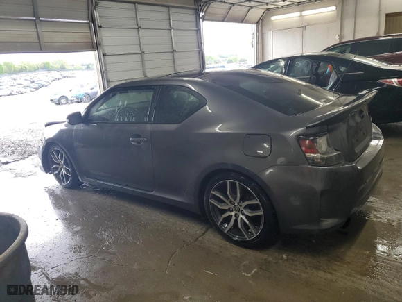 2015 Scion tC with VIN JTKJF5C70FJ002254, listed as a Copart auction lot 53077385 with 117,221 mi miles and Salvage Title. Bid and sale history available at carsss.com. Image 2.