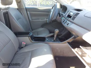 2003 Toyota Camry LE with VIN 4T1BE32K93U134041, listed as a IAAI auction lot 41834634 with 999,999 mi miles. Bid and sale history available at carsss.com. Image 5.