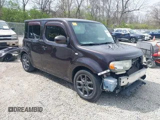 2009 Nissan Cube SL z VIN JN8AZ28R39T111263, wystawiony jako IAAI lot #42050350 z przebiegiem 253 666 mil mil oraz . Historia ofert i sprzedaży dostępna na DreamBid. Obrazek 1.