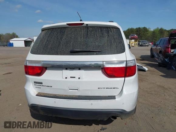 2013 Dodge Durango Citadel with VIN 1C4RDJEG0DC665962, listed as a IAAI auction lot 41900527 with 173,550 mi miles and . Bid and sale history available at carsss.com. Image 17.