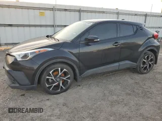 2018 Toyota C-HR XLE z VIN NMTKHMBX8JR048930, wystawiony jako Copart lot #52651585 z przebiegiem 81 911 mil mil oraz Szkoda całkowita • Salvage title. Historia ofert i sprzedaży dostępna na DreamBid. Obrazek 1.