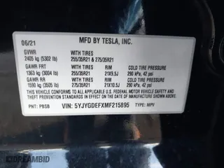 2021 Tesla Model Y Performance with VIN 5YJYGDEFXMF215895, listed as a IAAI auction lot 41622716 with 72,596 mi miles. Bid and sale history available at carsss.com. Image 9.