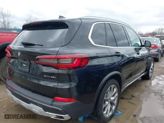 2023 BMW X5 xDrive40i with VIN 5UXCR6C01P9R91795, listed as a IAAI auction lot 41838232 with 30,741 mi miles. Bid and sale history available at carsss.com. Image 4.