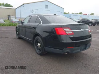 2014 Ford Police Interceptor with VIN 1FAHP2MK9EG101144, listed as a IAAI auction lot 42456061 with 160,659 mi miles and . Bid and sale history available at DreamBid. Image 3.
