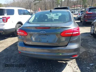 2017 Ford Focus S z VIN 1FADP3E29HL269607, wystawiony jako IAAI lot #41654836 z przebiegiem 101 645 mil mil oraz . Historia ofert i sprzedaży dostępna na DreamBid. Obrazek 16.