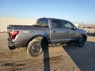 2024 Nissan Titan Pro-4X with VIN 1N6AA1ED7RN106901, listed as a Copart auction lot 43573995 with 42,973 mi miles and Salvage title. Bid and sale history available at DreamBid. Image 3.