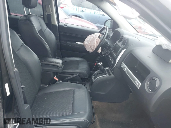 2017 Jeep Compass High Altitude with VIN 1C4NJDEB4HD205233, listed as a IAAI auction lot 41753295 with 89,695 mi miles and . Bid and sale history available at DreamBid. Image 5.