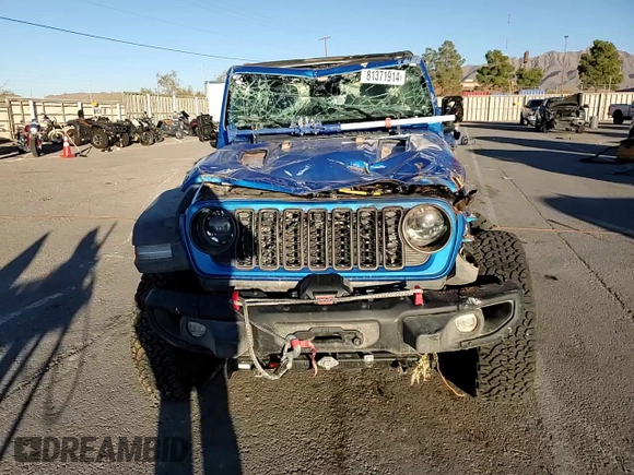 2024 Jeep Wrangler Rubicon z VIN 1C4PJXCG1RW298288, wystawiony jako Copart lot #81371914 z przebiegiem 4 445 mil mil oraz Szkoda całkowita • Salvage title. Historia ofert i sprzedaży dostępna na DreamBid. Obrazek 11.