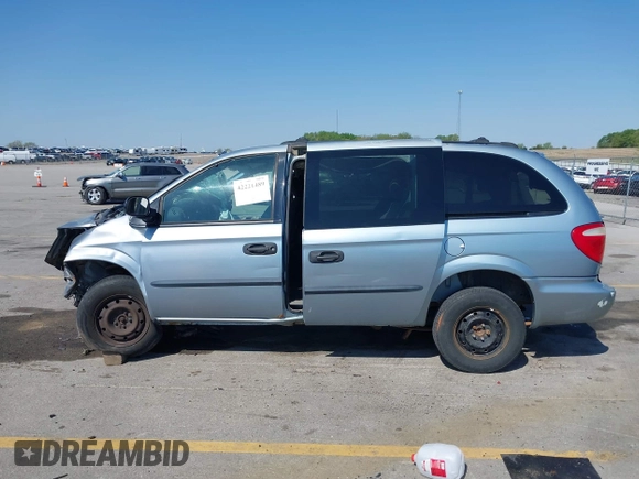 2004 Dodge Caravan SE z VIN 1D4GP24R04B582001, wystawiony jako IAAI lot #42221489 z przebiegiem Nie podano mil oraz . Historia ofert i sprzedaży dostępna na DreamBid. Obrazek 13.