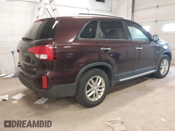 2014 Kia Sorento LX with VIN 5XYKT4A7XEG462778, listed as a IAAI auction lot 41981022 with 126,520 mi miles and . Bid and sale history available at carsss.com. Image 4.