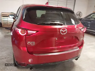 2020 Mazda CX-5 Grand Touring with VIN JM3KFBDM1L1809951, listed as a IAAI auction lot 41345854 with 117,376 mi miles. Bid and sale history available at carsss.com. Image 17.