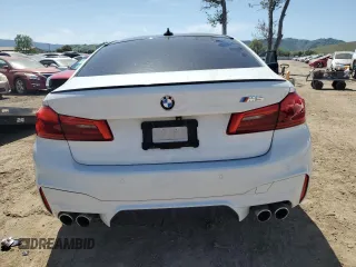 2019 BMW M5 z VIN WBSJF0C56KB446714, wystawiony jako Copart lot #52604265 z przebiegiem 63 401 mil mil oraz Szkoda całkowita • Salvage title. Historia ofert i sprzedaży dostępna na DreamBid. Obrazek 6.