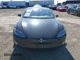 2020 Tesla Model S Long Range with VIN 5YJSA1E23LF381872, listed as a IAAI auction lot 41763046 with 96,720 mi miles and . Bid and sale history available at DreamBid. Image 13.