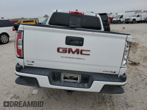 2022 GMC Canyon 4WD AT4 w/Cloth with VIN 1GTG6FEN8N1136558, listed as a Copart auction lot 82026324 with 68,281 mi miles and Salvage Title. Bid and sale history available at carsss.com. Image 6.