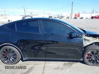 2021 Tesla Model Y Performance with VIN 5YJYGDEF9MF251738, listed as a IAAI auction lot 41708950 with 61,248 mi miles and . Bid and sale history available at DreamBid. Image 14.