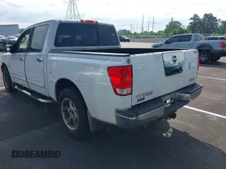 2004 Nissan Titan LE with VIN 1N6AA07A34N517511, listed as a IAAI auction lot 42250560 with 122,189 mi miles and . Bid and sale history available at DreamBid. Image 3.