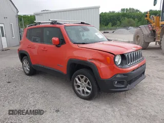 2017 Jeep Renegade Latitude z VIN ZACCJBBBXHPF87320, wystawiony jako IAAI lot #42232852 z przebiegiem 101 798 mil mil oraz . Historia ofert i sprzedaży dostępna na DreamBid. Obrazek 1.