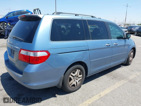 2005 Honda Odyssey EX-L with VIN 5FNRL38785B110823, listed as a IAAI auction lot 42154177 with 195,298 mi miles. Bid and sale history available at carsss.com. Image 4.
