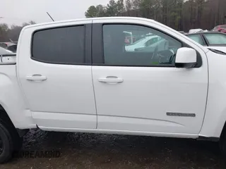 2022 GMC Canyon 4WD Elevation z VIN 1GTG6CEN1N1330671, wystawiony jako IAAI lot #41227361 z przebiegiem 24 579 mil mil oraz . Historia ofert i sprzedaży dostępna na DreamBid. Obrazek 13.