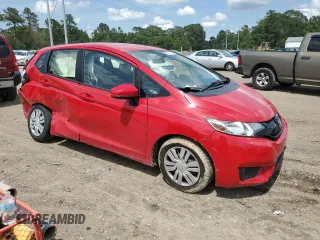 2016 Honda Fit LX with VIN JHMGK5H54GX010407, listed as a Copart auction lot 60127785 with 70,089 mi miles and Salvage title. Bid and sale history available at DreamBid. Image 4.