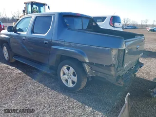 2013 Honda Ridgeline RTL with VIN 5FPYK1F55DB004842, listed as a IAAI auction lot 41843327 with 178,997 mi miles. Bid and sale history available at carsss.com. Image 3.