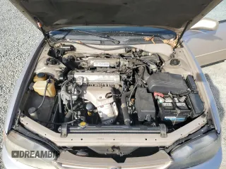 1996 Toyota Camry z VIN 4T1EG12K8TU779386, wystawiony jako Copart lot #79189014 z przebiegiem 142 891 mil mil oraz Czysty tytuł • Clean title. Historia ofert i sprzedaży dostępna na DreamBid. Obrazek 11.