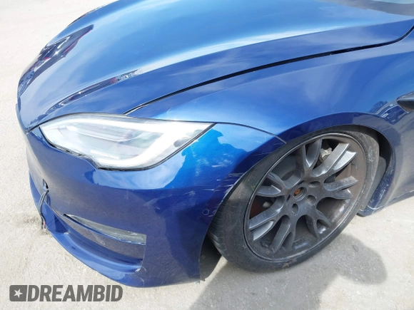 2021 Tesla Model S Long Range with VIN 5YJSA1E51MF442874, listed as a IAAI auction lot 39406495 with 36,127 mi miles and . Bid and sale history available at DreamBid. Image 22.