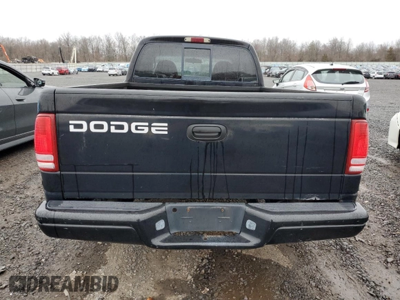 2001 Dodge Dakota Sport z VIN 1B7GL22N31S137577, wystawiony jako Copart lot #50119405 z przebiegiem Nie podano mil oraz Czysty tytuł • Clean title. Historia ofert i sprzedaży dostępna na DreamBid. Obrazek 6.