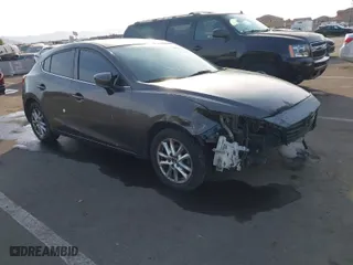 2015 Mazda Mazda3 i Touring with VIN 3MZBM1L74FM236410, listed as a IAAI auction lot 41339253 with 119,731 mi miles. Bid and sale history available at carsss.com. Image 1.