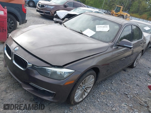 2012 BMW 3 Series 328i with VIN WBA3A5C5XCF349888, listed as a IAAI auction lot 41954810 with 163,070 mi miles. Bid and sale history available at carsss.com. Image 2.