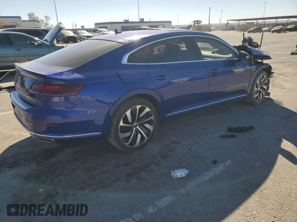 2021 Volkswagen Arteon SEL R-Line с VIN WVWHR7AN0ME012914, выставлен на аукционе Copart как лот 43871805 с пробегом 59 657 миль миль и Списание • Salvage title. История ставок и продаж доступна на DreamBid. Изображение 3.