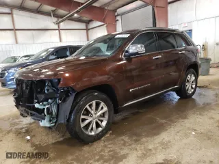 2014 Jeep Grand Cherokee Summit with VIN 1C4RJFJG2EC404605, listed as a Copart auction lot 52082335 with 157,220 mi miles and Clean Title. Bid and sale history available at carsss.com. Image 1.
