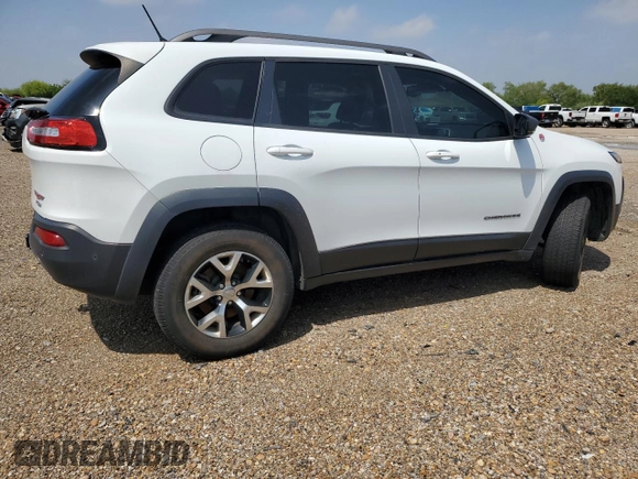 2014 Jeep Cherokee Trailhawk with VIN 1C4PJMBS9EW140344, listed as a Copart auction lot 50579005 with 117,326 mi miles and Salvage Title. Bid and sale history available at carsss.com. Image 3.