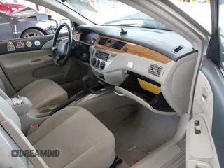 2005 Mitsubishi Lancer ES with VIN JA3AJ26E65U017027, listed as a IAAI auction lot 41765578 with 58,698 mi miles. Bid and sale history available at carsss.com. Image 5.