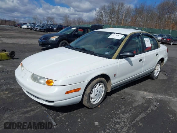 2000 Saturn SL z VIN 1G8ZH5280YZ251280, wystawiony jako IAAI lot #41742836 z przebiegiem 180 249 mil mil oraz . Historia ofert i sprzedaży dostępna na DreamBid. Obrazek 2.