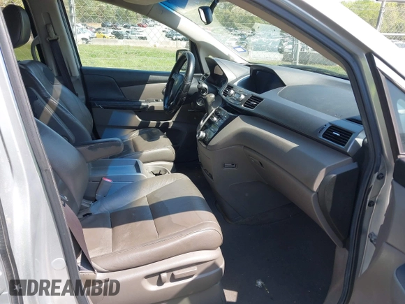 2011 Honda Odyssey EX-L with VIN 5FNRL5H62BB075789, listed as a IAAI auction lot 42035746 with 238,616 mi miles and . Bid and sale history available at carsss.com. Image 5.