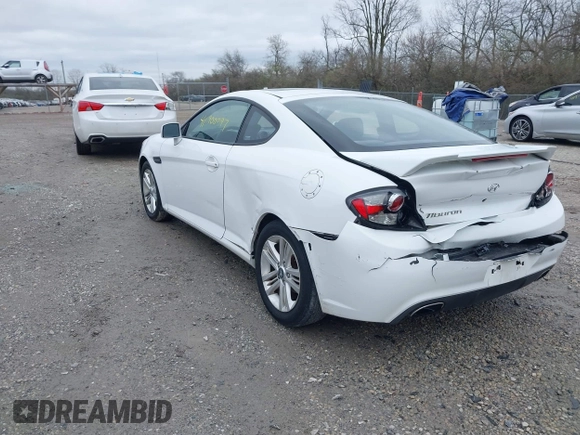 2008 Hyundai Tiburon GS z VIN KMHHM66D58U283273, wystawiony jako IAAI lot #41900097 z przebiegiem 154 013 mil mil oraz . Historia ofert i sprzedaży dostępna na DreamBid. Obrazek 3.