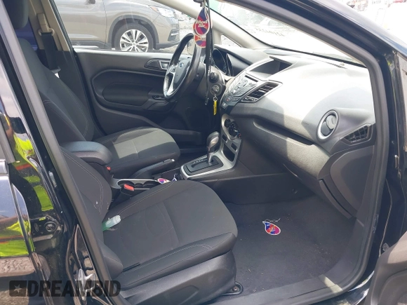 2016 Ford Fiesta SE with VIN 3FADP4EJ2GM150453, listed as a IAAI auction lot 42104235 with 124,423 mi miles and . Bid and sale history available at carsss.com. Image 5.