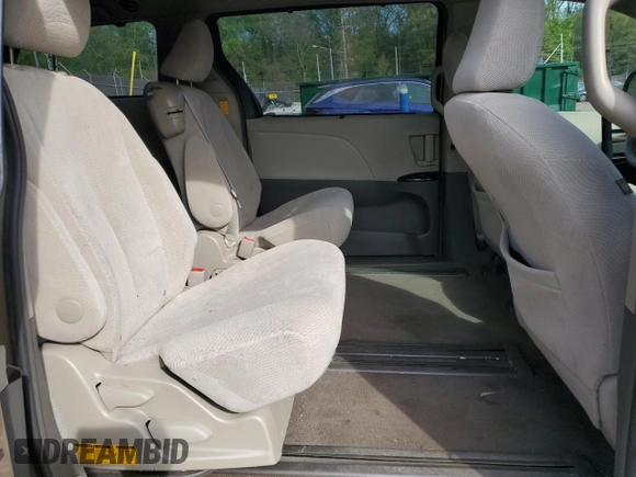2014 Toyota Sienna LE AAS z VIN 5TDKK3DC2ES444056, wystawiony jako Copart lot #54064405 z przebiegiem 146 550 mil mil oraz Szkoda całkowita • Salvage title. Historia ofert i sprzedaży dostępna na DreamBid. Obrazek 11.